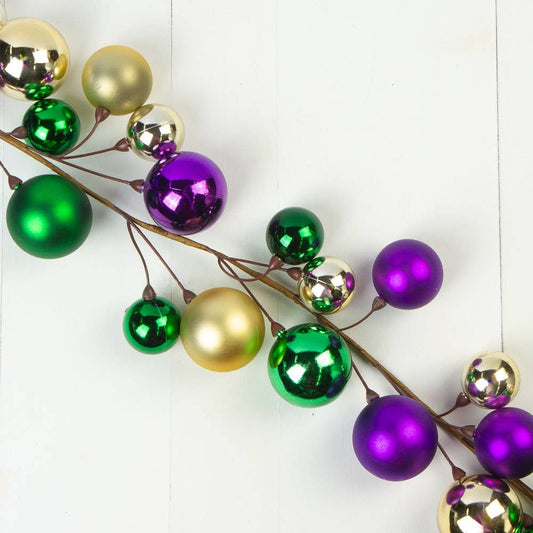 5-ft Mardi Gras garland featuring large purple, gold, and green ball ornaments—ideal for festive décor