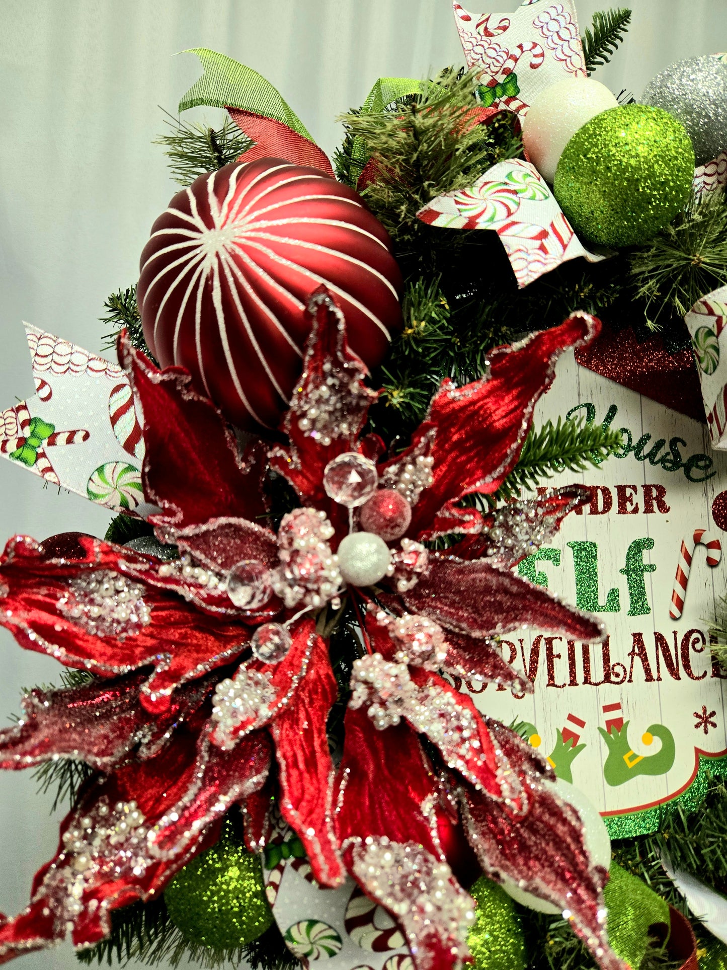 18″ Elf-themed Christmas wreath in red, green, and white, handcrafted ribbon wreath perfect for holiday décor