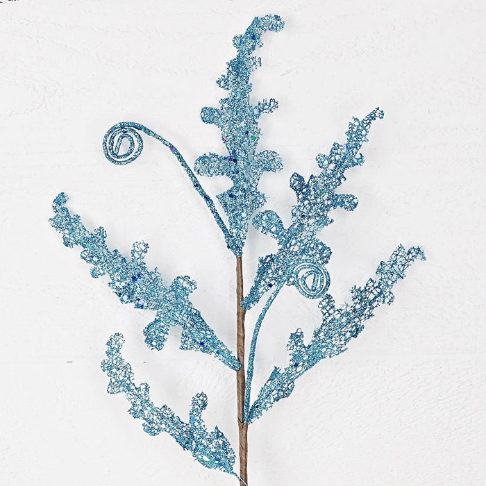 Close-up detail of mesh parrot fern spray showing colorful parrot-like foliage and distinctive mesh texture for exotic plant displays