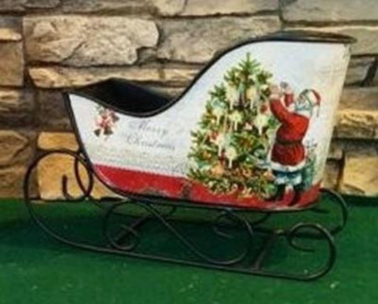 Metal sled with Vintage Santa figure for nostalgic Christmas décor