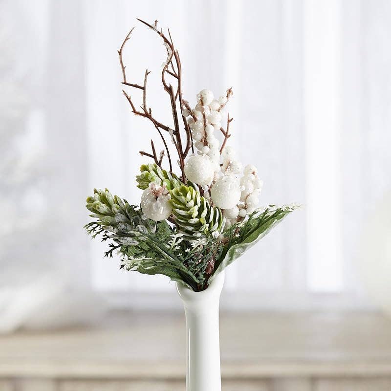 Detail shot of winter berry pick displaying realistic frosted twigs cedar and snowy white winter elements with sparkle