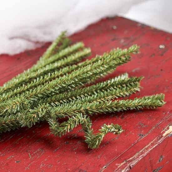 Individual Canadian pencil pine stem highlighting realistic texture and wire stem flexibility for custom arrangements