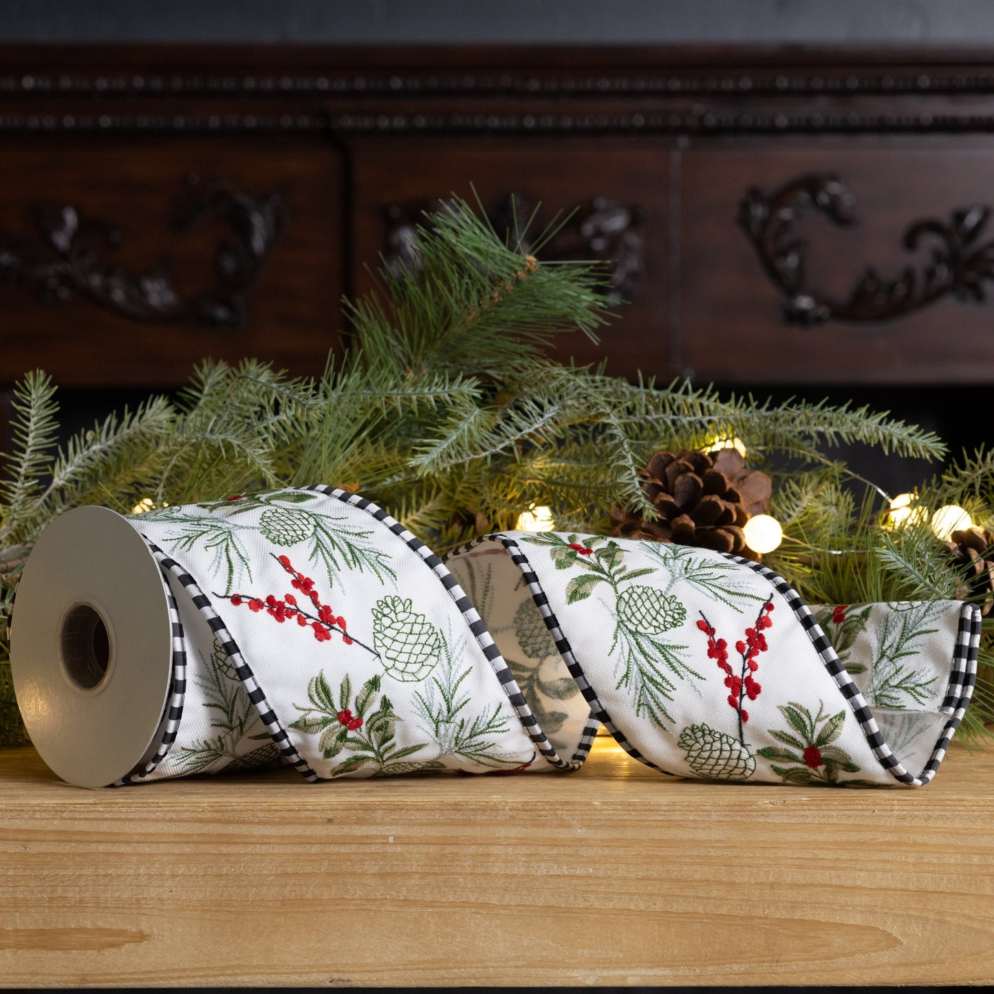 Pine berry wired ribbon, 4″ x 5 yd roll, featuring white, green, and red pine and berry design—ideal for holiday décor and crafts