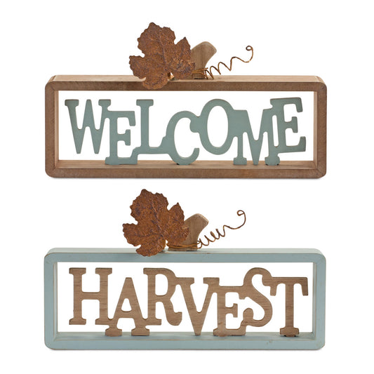Set of two fall tabletop signs reading “Welcome” and “Harvest” in brown and teal with tin leaf accents