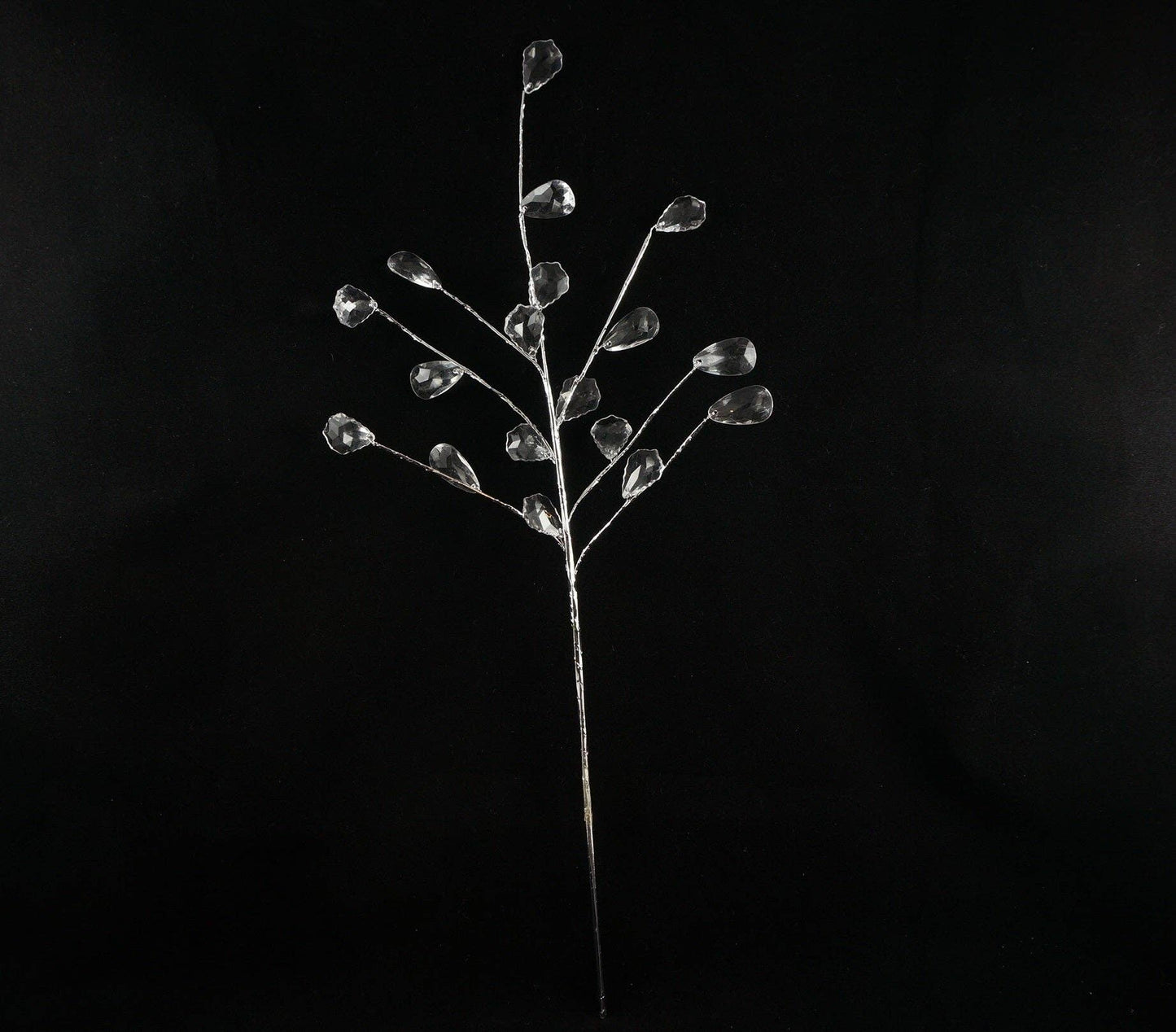 Close-up detail of acrylic leaf pick showing crystal clear transparency and realistic leaf texture design