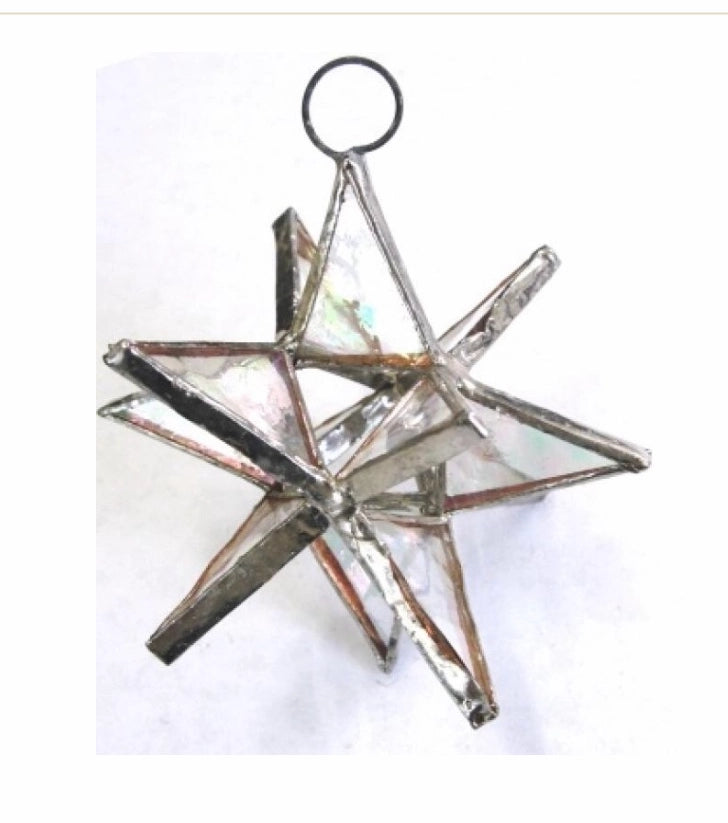 A 3-inch Moravian star ornament made of clear, textured stained glass with dark solder lines, hanging against a white background.