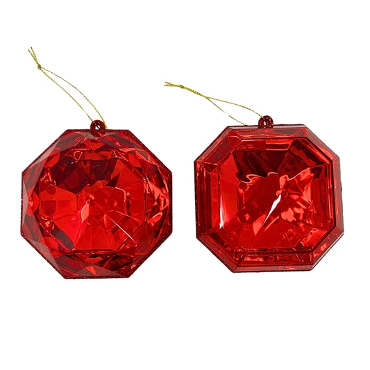 A 4-inch ruby red, multi-faceted gem ornament in a teardrop shape, hanging against a white background.
