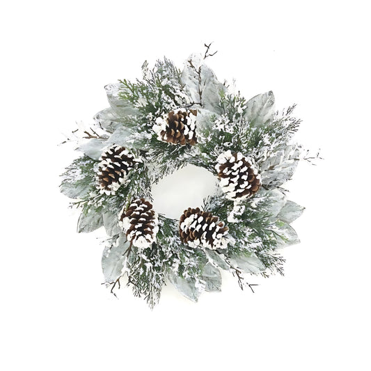 22-inch-wreath featuring cedar and magnolia leaves in lush green plastic suitable for festive indoor or covered outdoor display

