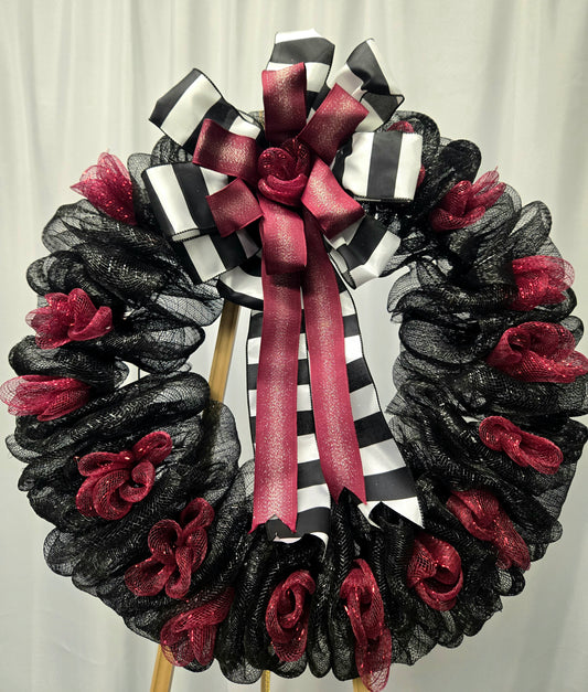 16″ Gothic Halloween wreath in black and burgundy with pumpkins, mesh, berry accents, lavish ribbon, and tombstone décor
