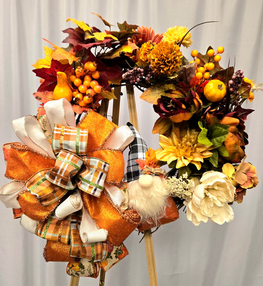 12″ Fall Gnome wreath with orange, brown, beige florals, pumpkin berry picks and large multi-ribbon bow
