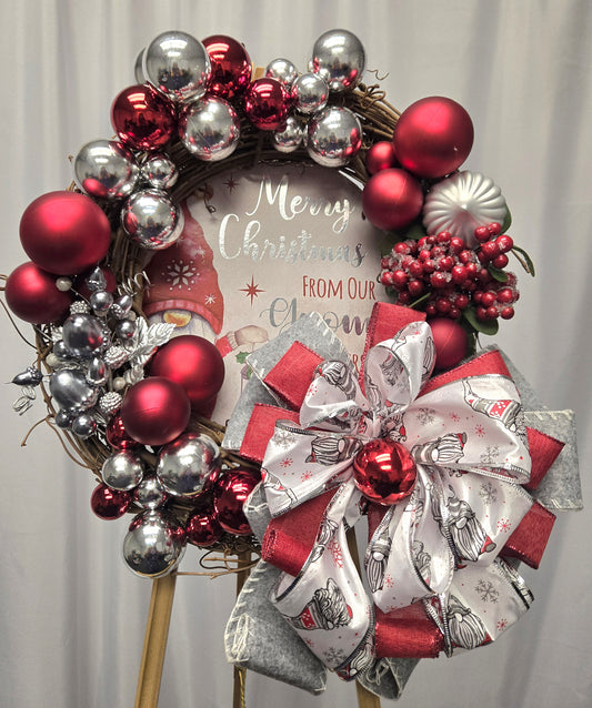 12″ Christmas wreath in red, silver, and white featuring a whimsical gnome accent
