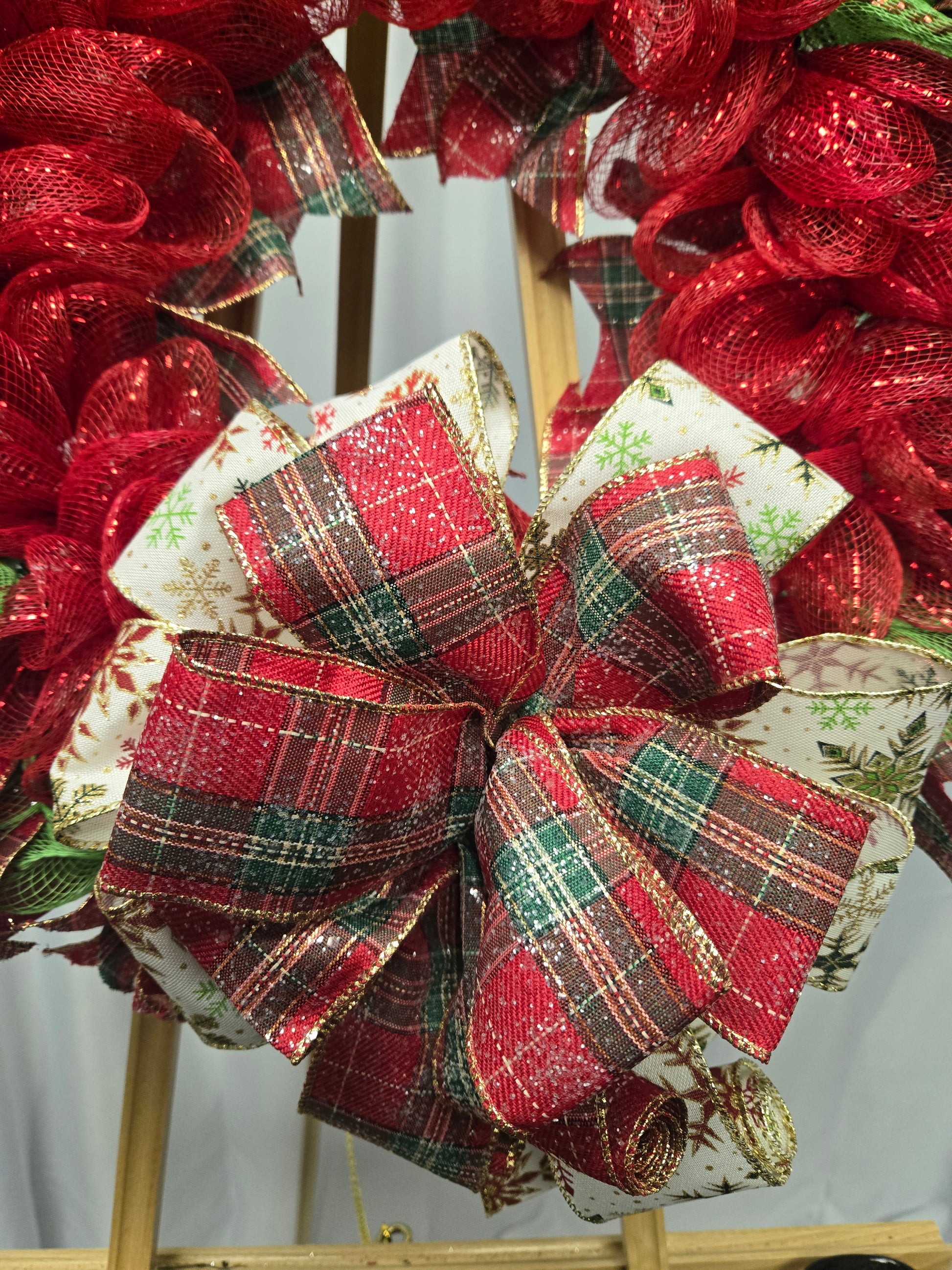 14″ Christmas wreath with red and green ribbon—handcrafted holiday décor
