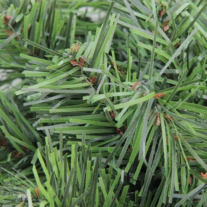 Close-up view of Canadian pine wreath showing detailed artificial pine needle construction and classic Christmas wreath design