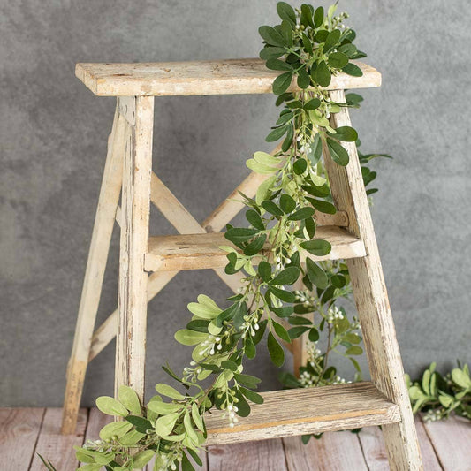 Faux tea olive greenery displaying realistic artificial foliage perfect for home decorating at RRO Home