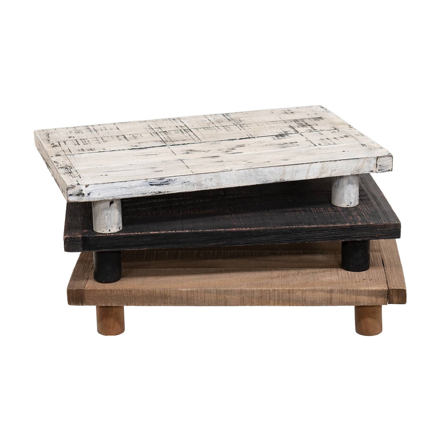Close-up view of distressed black wooden riser displaying chunky wood slat construction and weathered paint finish
