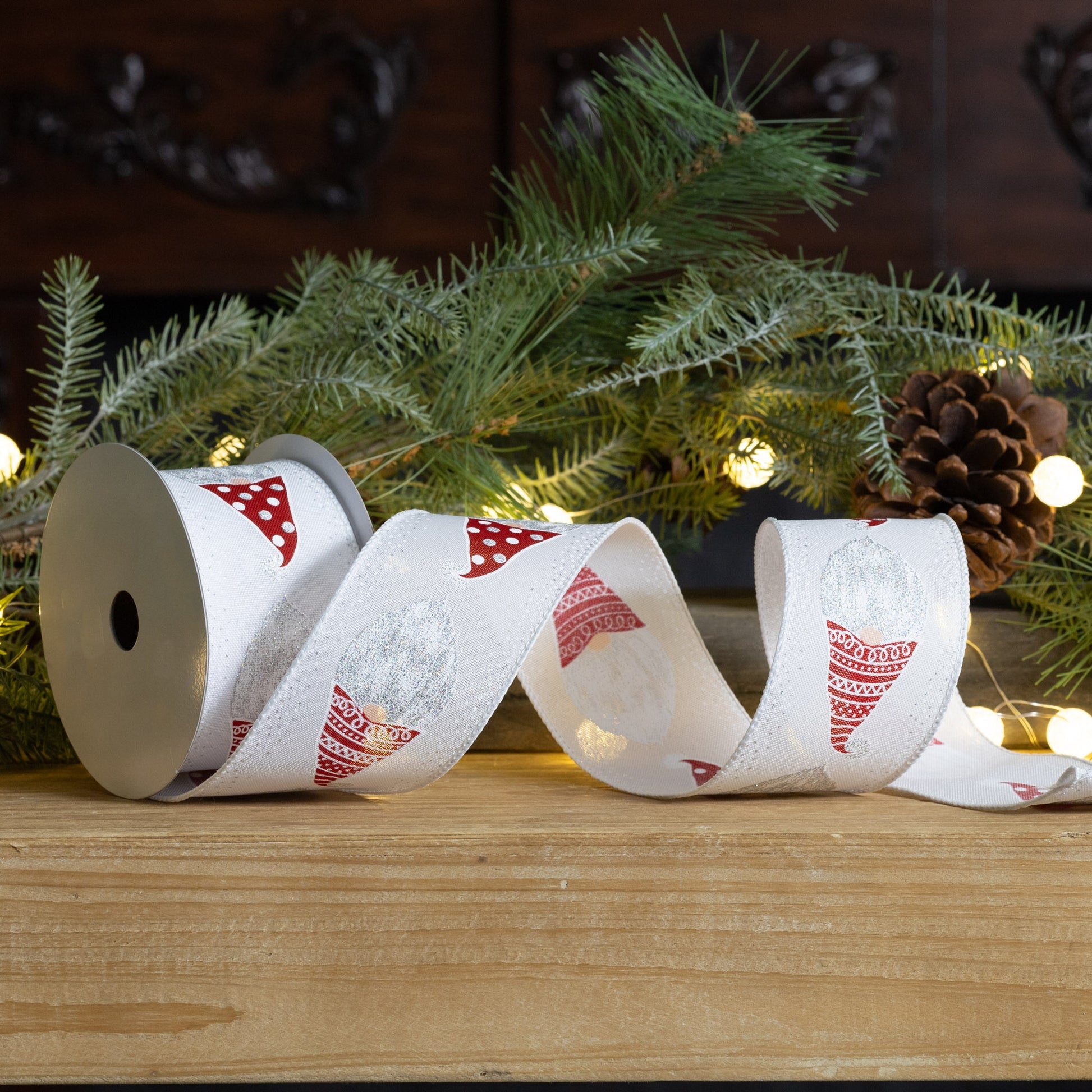 Red and white wired ribbon featuring Gnome Santa head design, set of 2 (2.5″ x 10 yd each), ideal for bows, wreaths, and festive decorating