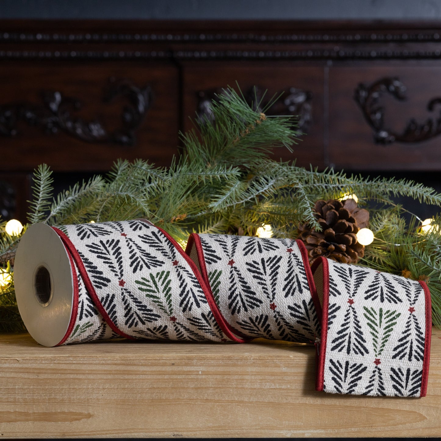 4″ × 5 yd wired cotton ribbon with rustic black & beige pine tree pattern—ideal for holiday bows, wreaths, and craft projects
