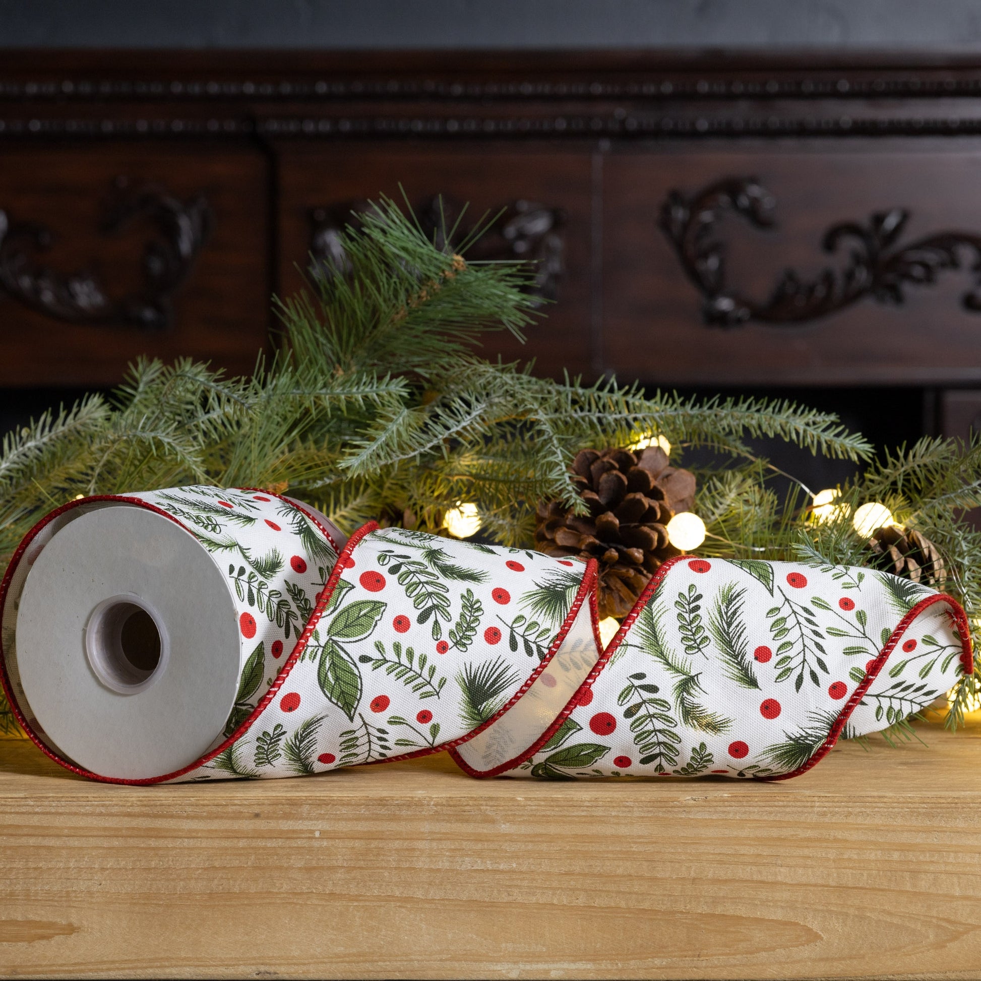 4″ × 10 yd wired cotton ribbon with classic holly berry design in white, green, and red—perfect for bows, wreaths, and festive crafts
