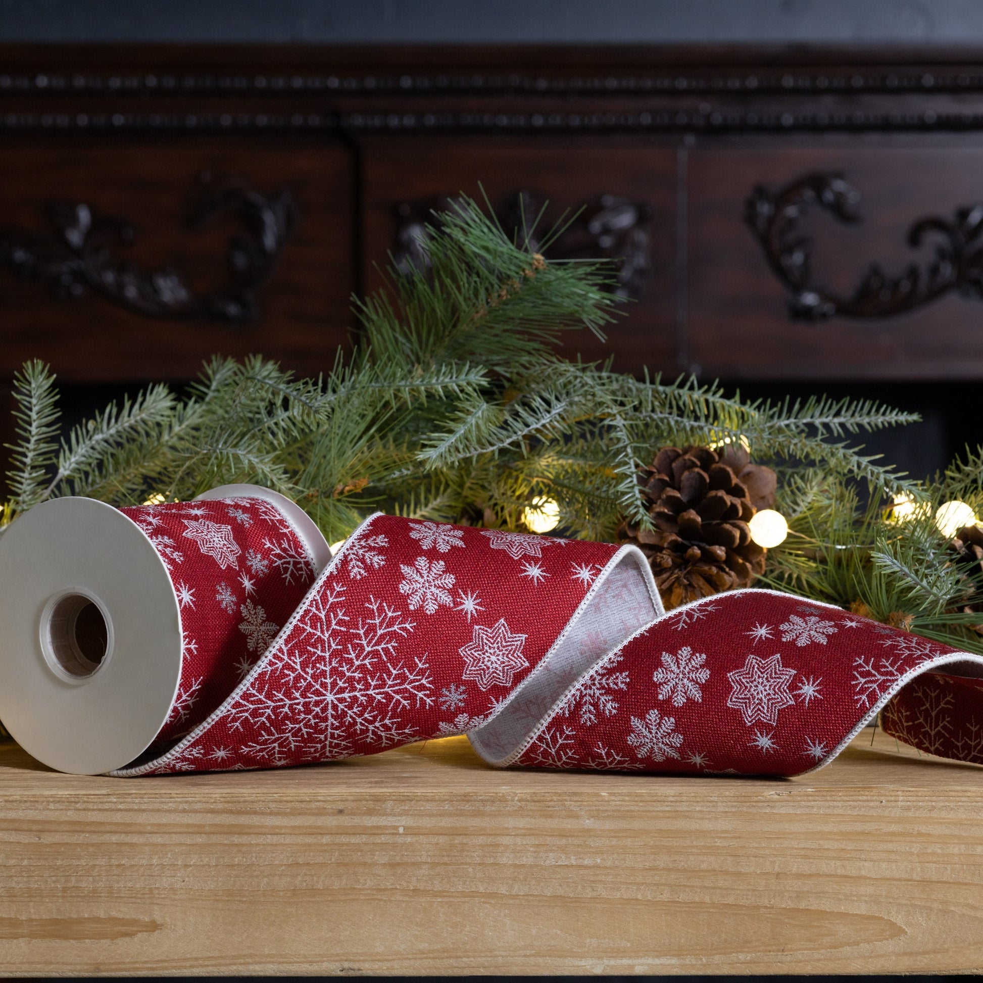 4″ × 5 yd wired polyester ribbon in red and white snowflake pattern
