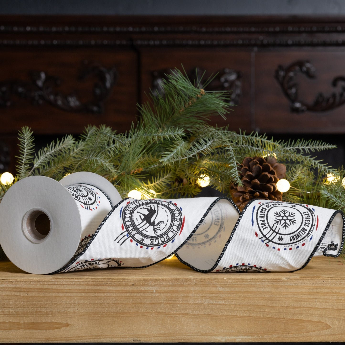 Wired cotton ribbon set – 4″ × 5 yd rolls in white with black North Pole postal design
