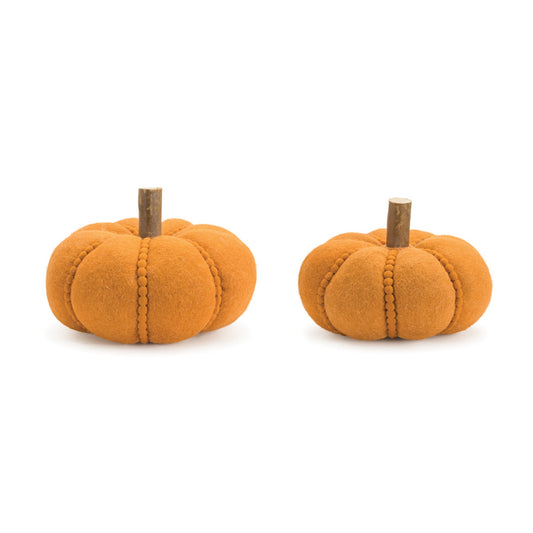 Set of two felt wool pumpkins with orange-brown tones, wooden log stems and beaded accents for rustic fall décor
