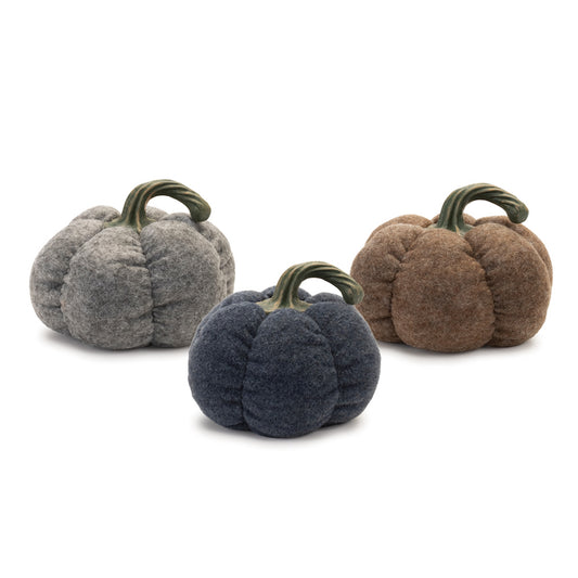 Three plush pumpkins with warm orange, cream, and brown hues in varying sizes for fall décor
