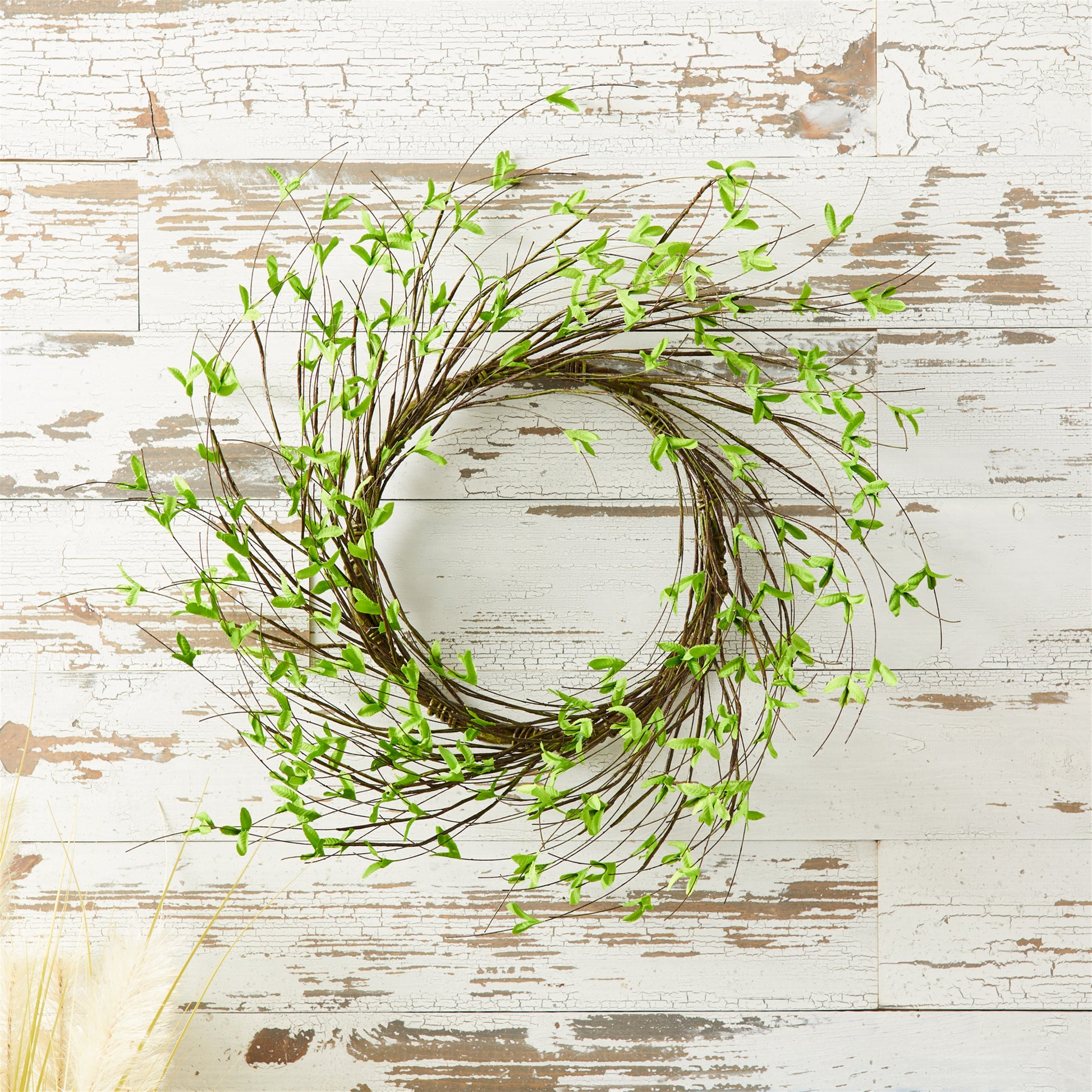 22 inch mini leaf twig wreath with natural green leaves and twig accents
