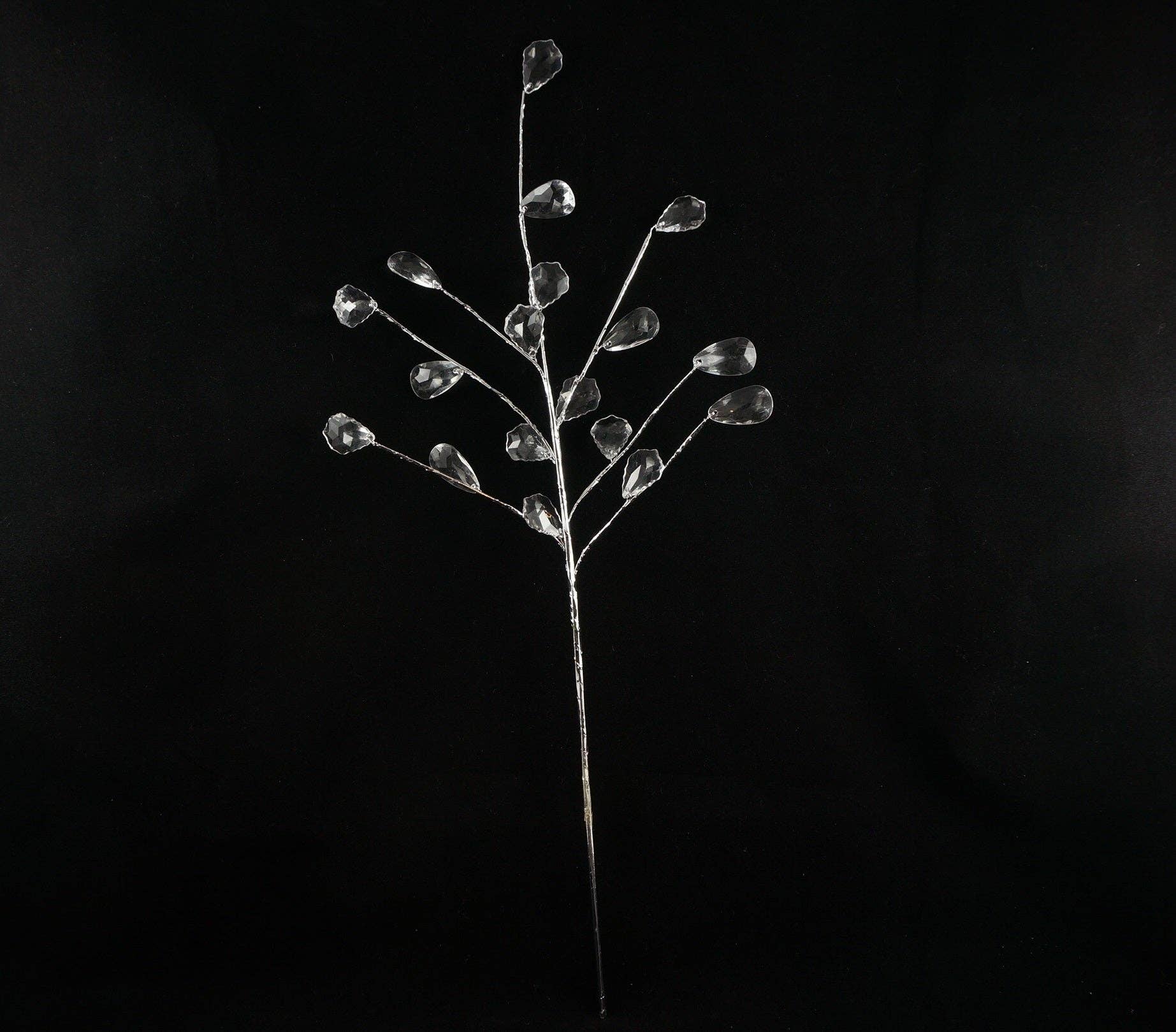 Close-up detail of acrylic leaf pick showing crystal clear transparency and realistic leaf texture design