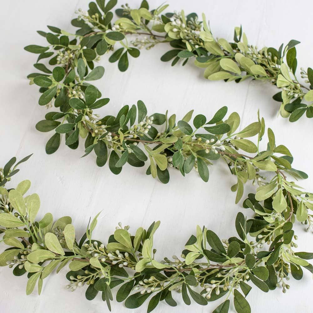 Tea olive greenery garland option displaying flexible artificial foliage for versatile decorating applications at RRO Home