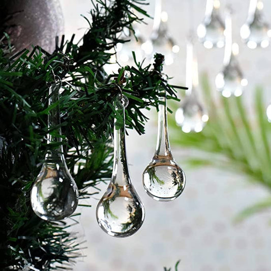 Clear glass teardrop Christmas ornament with elegant translucent finish for tree decorating