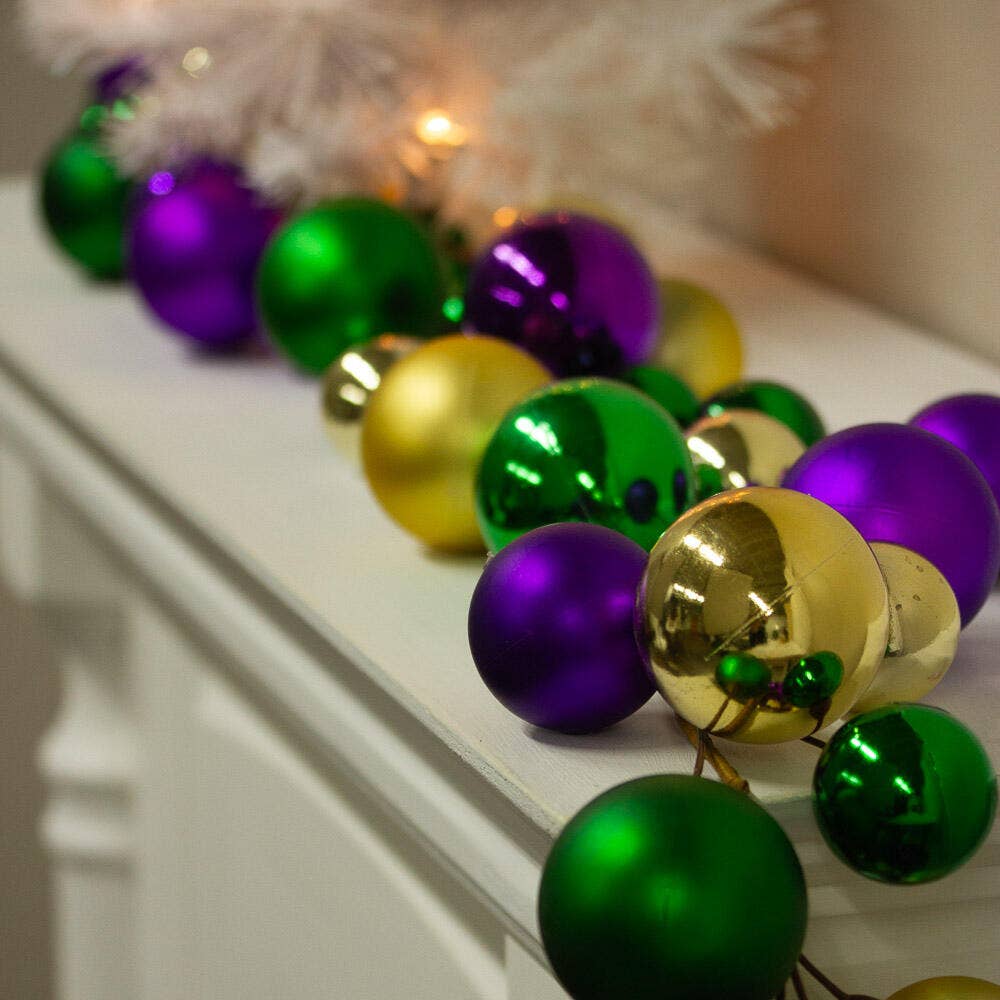 5-ft Mardi Gras garland featuring large purple, gold, and green ball ornaments—ideal for festive décor
